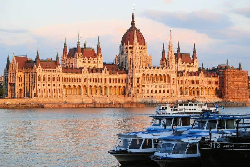 Hungarian Parliament Building With Boat