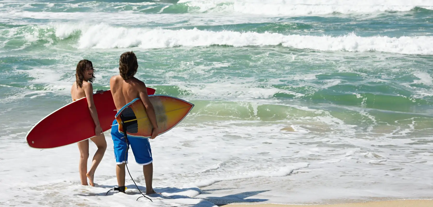 surfing in uluwatu beach